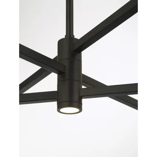The Articular chandelier combines architectural design with functional flexibility. Its rotating arms allow customizable light direction, while integrated LED technology delivers warm, high-CRI illumination. The coal black finish adds bold contrast. - alternate view