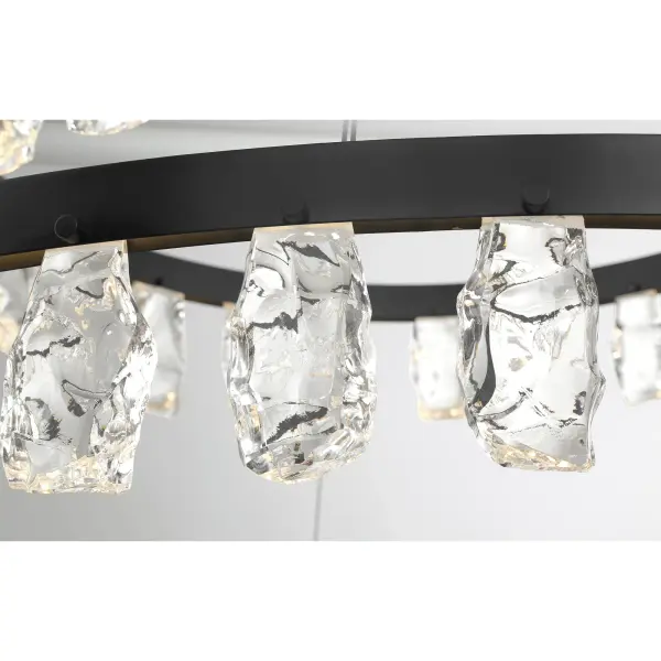 The Artic Glacier chandelier makes a bold architectural statement with its dramatic 49-inch span and two-tier design. Clear faux rock crystal elements create an organic, glacier-like aesthetic against the coal black finish. - alternate view