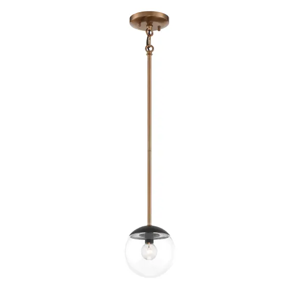 The Outer Limits mini pendant combines painted bronze with brushed brass accents for a sophisticated transitional look. At 6 inches wide, it's perfectly sized for smaller spaces or grouped installations over islands and bars.