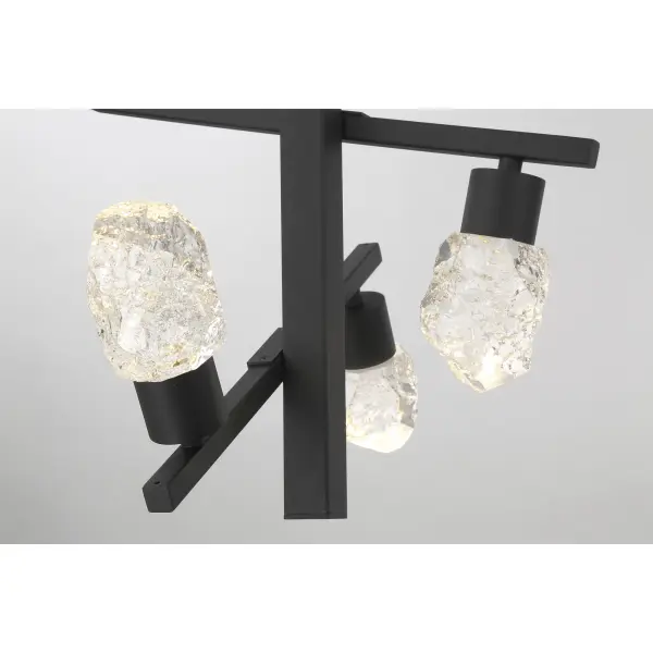 The Kosmyc pendant combines contemporary design with organic texture through its faux rock crystal glass shades and Sand Coal Black finish. With 10 integrated LED lights delivering 2,613 lumens, it provides substantial illumination for foyers and dining spaces while making a bold visual statement. - alternate view