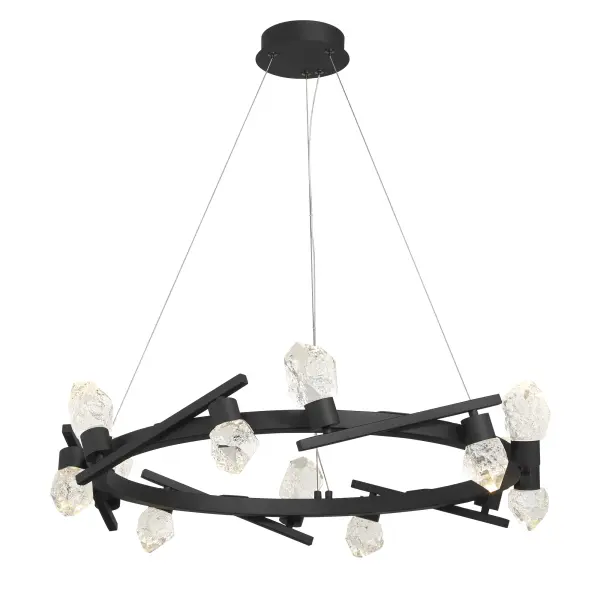 The Kosmyc chandelier combines contemporary design with industrial edge, featuring 12 integrated LED lights and distinctive faux rock crystal accents. Its substantial 33-inch width makes a bold statement in large spaces.