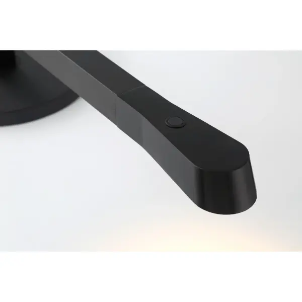 This sleek LED table lamp combines modern design with practical functionality. Features adjustable height, color-changing technology, and energy-efficient LED lighting in a sophisticated anodized brushed coal finish. - alternate view