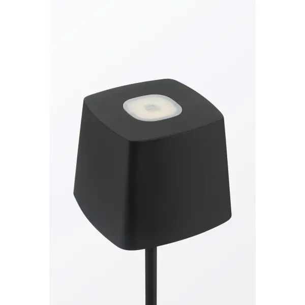 This compact rechargeable LED table lamp combines modern minimalist design with practical portability. The coal black finish and aluminum construction create a sophisticated look, while the USB-C rechargeable battery eliminates cord clutter. - alternate view