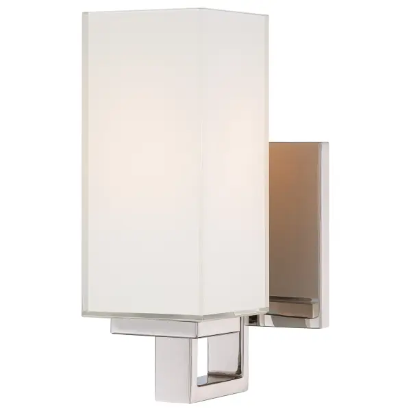 This compact wall sconce combines polished nickel finish with mitered glass for a refined look. Perfect for bathrooms and hallways, it offers dimmable lighting with a classic transitional style that complements both modern and traditional spaces.