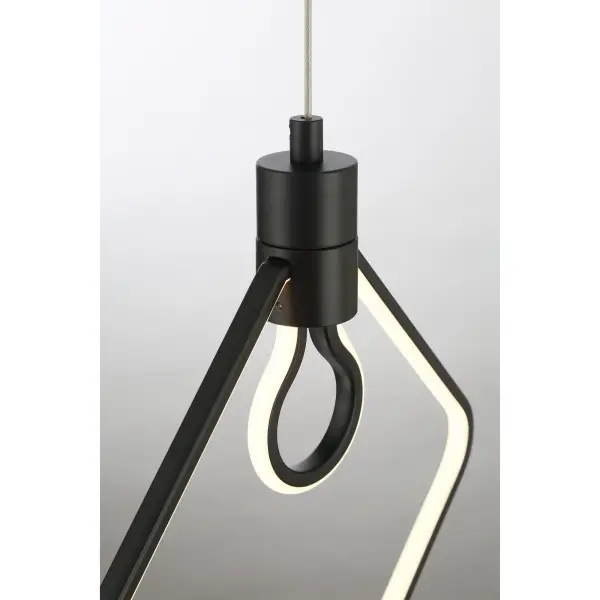 The Edison's Outline pendant combines industrial aesthetics with modern LED efficiency. Its frosted silicone sleeve creates soft, diffused light while the coal black finish adds contemporary edge to any space. - alternate view