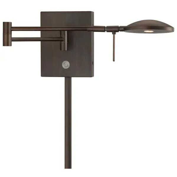 This transitional swing arm wall lamp combines functionality with style, featuring energy-efficient LED lighting and an adjustable arm perfect for reading. The copper bronze patina finish adds warmth and character.