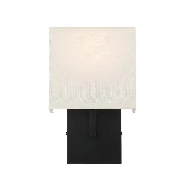 This compact wall sconce combines a sophisticated coal black finish with a soft off-white linen shade, creating warm ambient lighting. ADA-compliant and dimmable, it's perfect for modern spaces requiring both style and accessibility. - alternate view