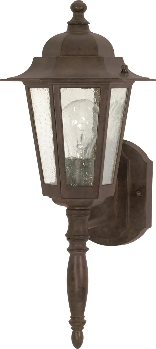 The Central Park wall lantern combines traditional design with clear seed glass for a warm, inviting glow. At 18 inches, it's perfectly sized for entryways, porches, and patios, offering reliable outdoor illumination with classic style.