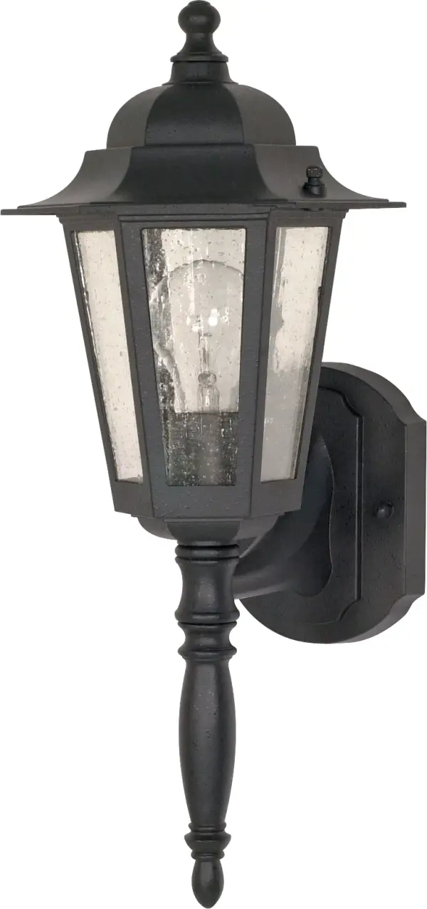 The Central Park wall lantern brings traditional elegance to outdoor spaces with its 18-inch profile and clear seeded glass. The black finish provides durability and classic appeal, perfect for enhancing entryways and patios.