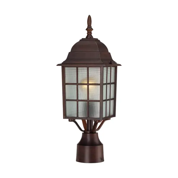 The Adams outdoor post light combines traditional styling with durable construction, featuring a bronze finish and frosted glass shade. At 17 inches tall, it provides welcoming illumination for pathways, driveways, and entryways.