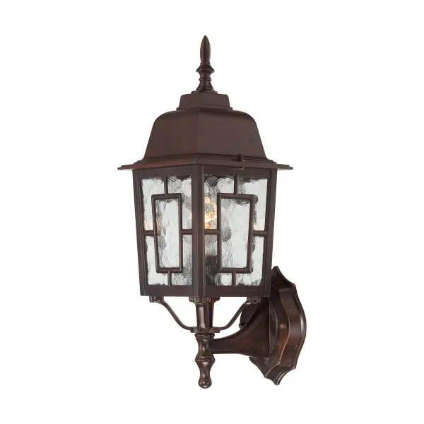 The Banyan outdoor wall sconce combines traditional styling with durable construction, featuring clear water glass that creates beautiful light patterns. At 17 inches, it provides substantial presence for entryways and outdoor living spaces.