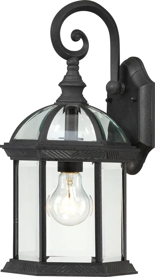 The Boxwood outdoor wall sconce combines traditional styling with durable construction. Its 15-inch height and clear beveled glass panels create elegant illumination for entryways and outdoor spaces.