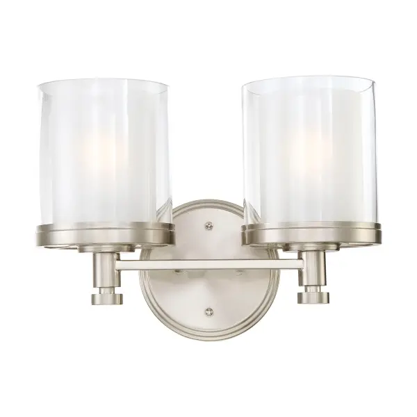 The Decker 2-light vanity fixture combines machined industrial style with a distinctive double glass shade design that creates depth and ambient glow. Perfect for modern bathrooms seeking character.
