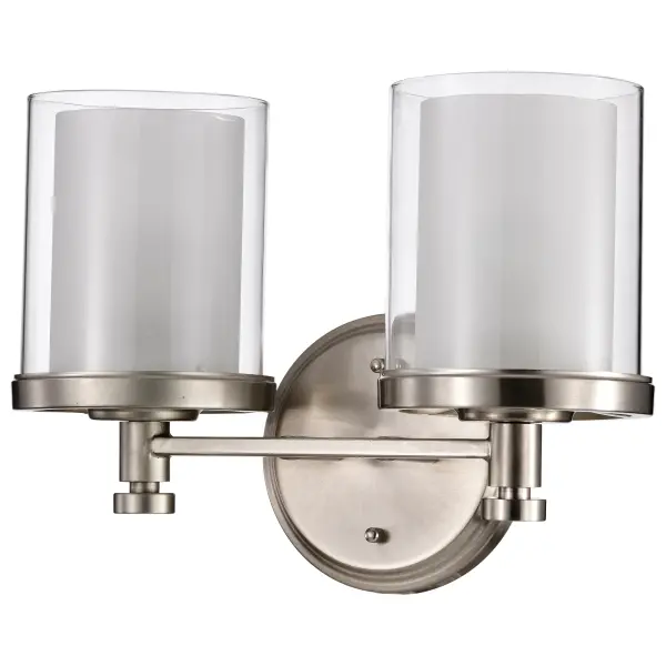 The Decker 2-light vanity fixture combines machined industrial style with a distinctive double glass shade design that creates depth and ambient glow. Perfect for modern bathrooms seeking character. - alternate view