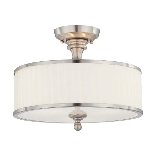 The Candice semi-flush mount beautifully bridges traditional chandelier elegance with contemporary finishes. Its brushed nickel frame and pleated white fabric shades create soft, diffused lighting perfect for intimate spaces.