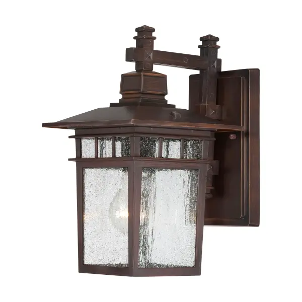 The Cove Neck wall lantern offers a unique fusion of Eastern-inspired design with classic Americana styling. Its rustic bronze finish and clear seeded glass create sophisticated curb appeal at an accessible price point.