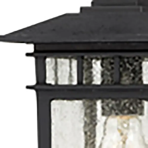 The Cove Neck outdoor pendant combines far eastern inspiration with classic Americana styling. Its textured black finish and clear seeded glass create sophisticated curb appeal while the compact 12-inch size fits various outdoor spaces. - alternate view