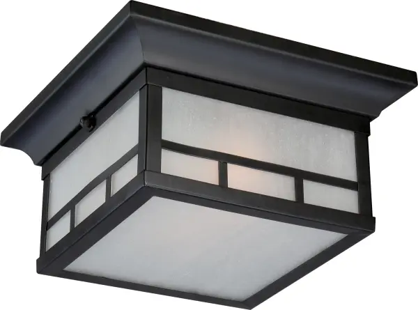 The Drexel flush mount combines modern elegance with practical outdoor durability. Its stone black finish and frosted seeded glass create ambient lighting perfect for entryways, porches, and covered patios.