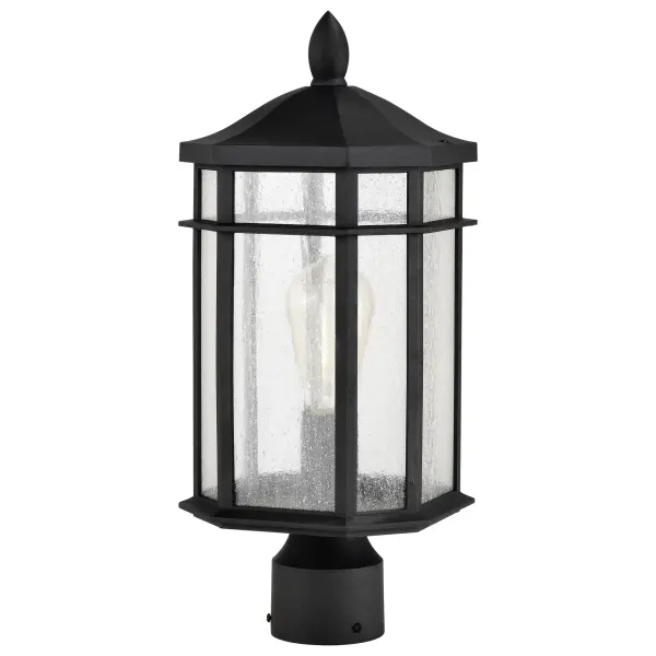 The Raiden post light combines traditional lantern styling with contemporary finishes, making it adaptable to various architectural styles. The clear seedy glass creates ambient lighting with vintage character.