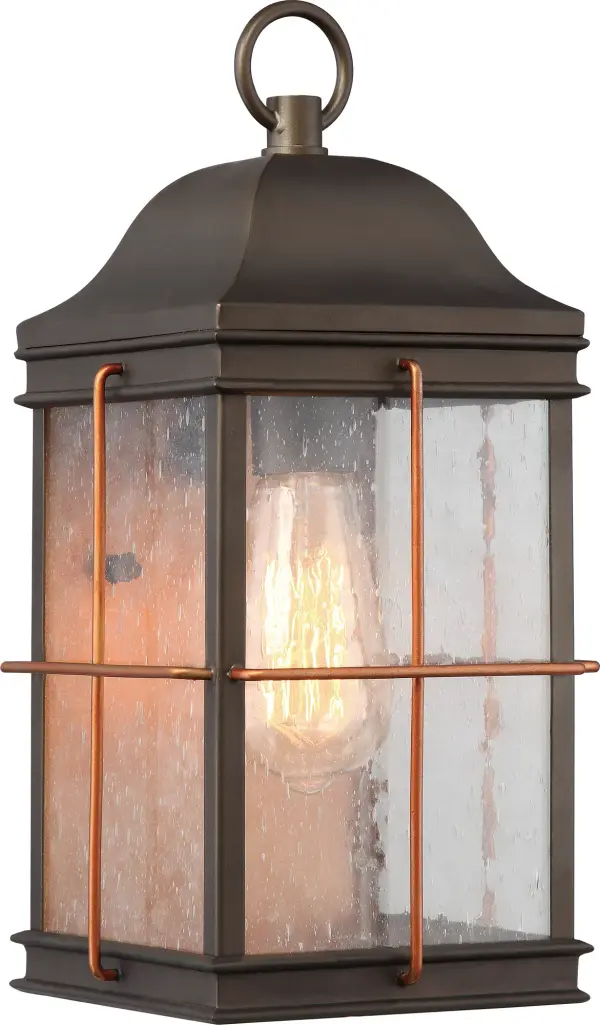 The Howell outdoor wall lantern combines contemporary elegance with vintage character. Bronze finish with copper accents and clear seeded glass create a sophisticated look for any exterior space.