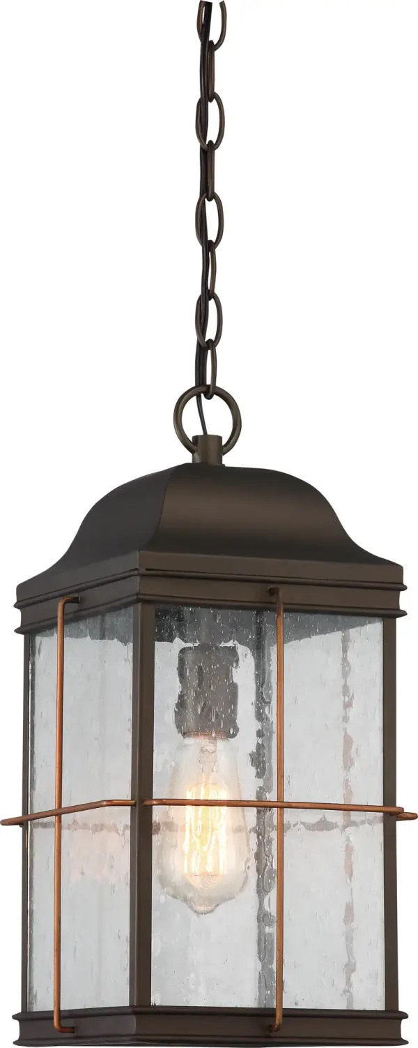The Howell outdoor hanging lantern combines traditional design with rustic copper accents, creating an inviting entrance or patio ambiance. Includes a 60W vintage-style bulb for instant warm illumination.