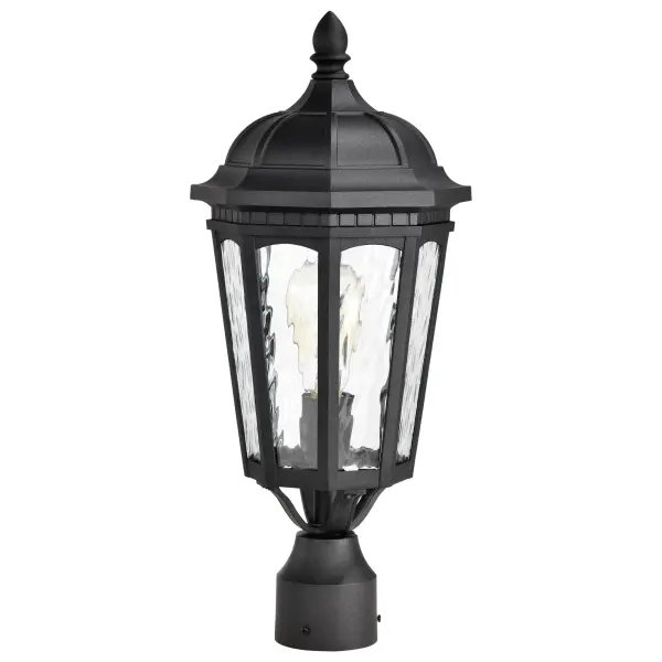 The East River post light combines old-world elegance with contemporary outdoor performance. Its rippling clear water glass creates beautiful light patterns while the matte black finish adds timeless sophistication to any exterior space. - alternate view