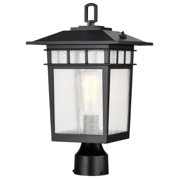 The Cove Neck post light combines classic craftsman design with modern versatility. Its die-cast aluminum construction and textured black finish complement various architectural styles, while clear seeded glass creates ambient illumination perfect for pathways and entryways.