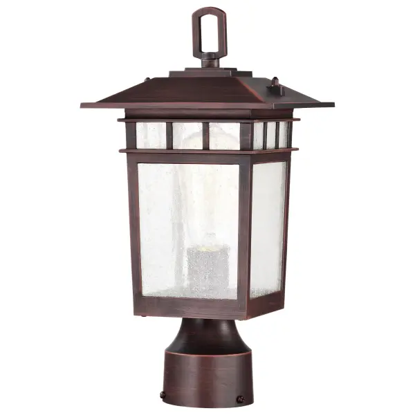 The Cove Neck post light combines classic craftsman design with modern versatility. Its die-cast aluminum construction and rustic bronze finish complement various architectural styles, while clear seeded glass creates ambient lighting perfect for pathways and entryways. - alternate view