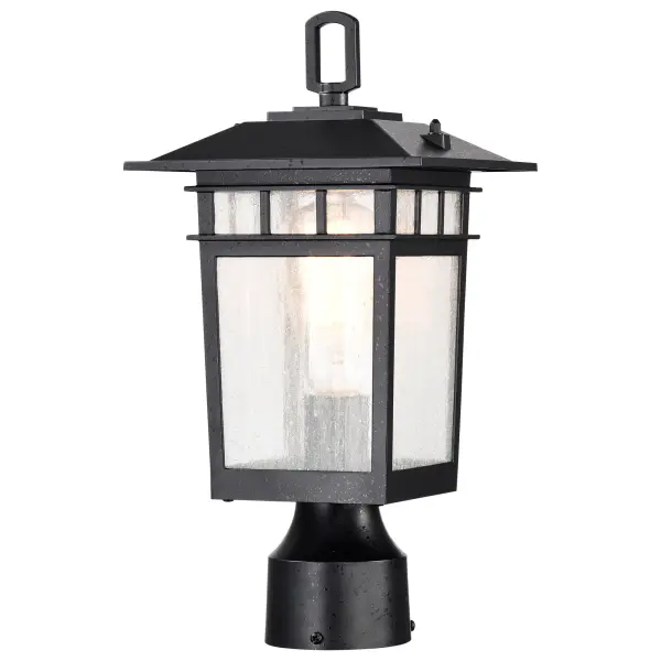 The Cove Neck post light combines classic craftsman design with modern versatility. Its die-cast aluminum construction and textured black finish complement various architectural styles, while clear seeded glass creates ambient lighting perfect for pathways and entryways.