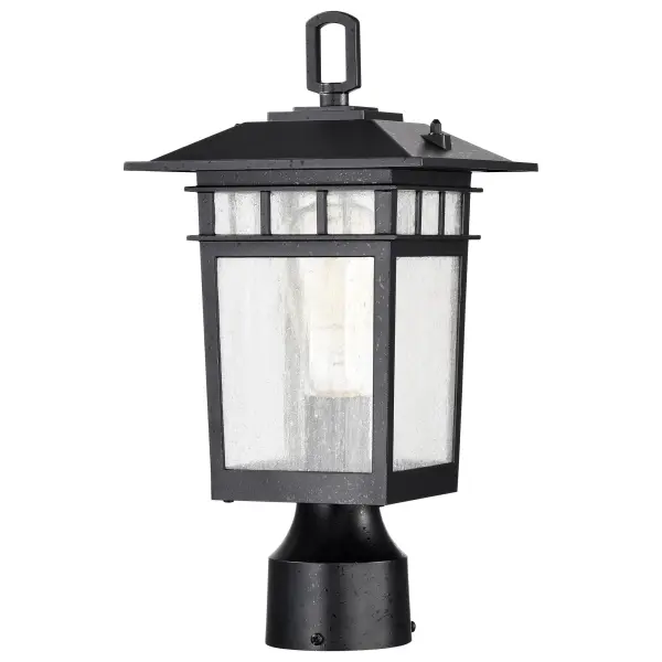 The Cove Neck post light combines classic craftsman design with modern versatility. Its die-cast aluminum construction and textured black finish complement various architectural styles, while clear seeded glass creates ambient lighting perfect for pathways and entryways. - alternate view