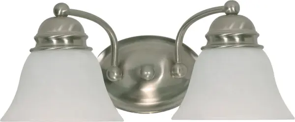 The Empire vanity light combines timeless design with practical illumination. Its 15-inch width and dual alabaster glass bell shades provide balanced lighting for bathroom vanities and powder rooms.