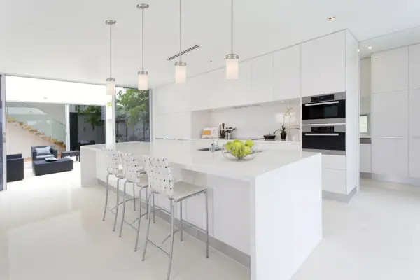 The Polaris mini pendant combines brushed nickel hardware with a classic white opal glass shade for versatile, sophisticated lighting. Perfect for kitchen islands, dining areas, and entryways where compact elegance is needed. - alternate view