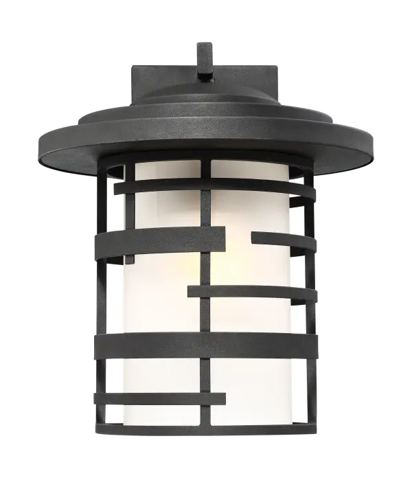 The Lansing outdoor wall lantern combines traditional lantern styling with contemporary clean lines in a weather-resistant textured black finish. Its etched glass diffuser provides soft illumination while the steel construction ensures durability.
