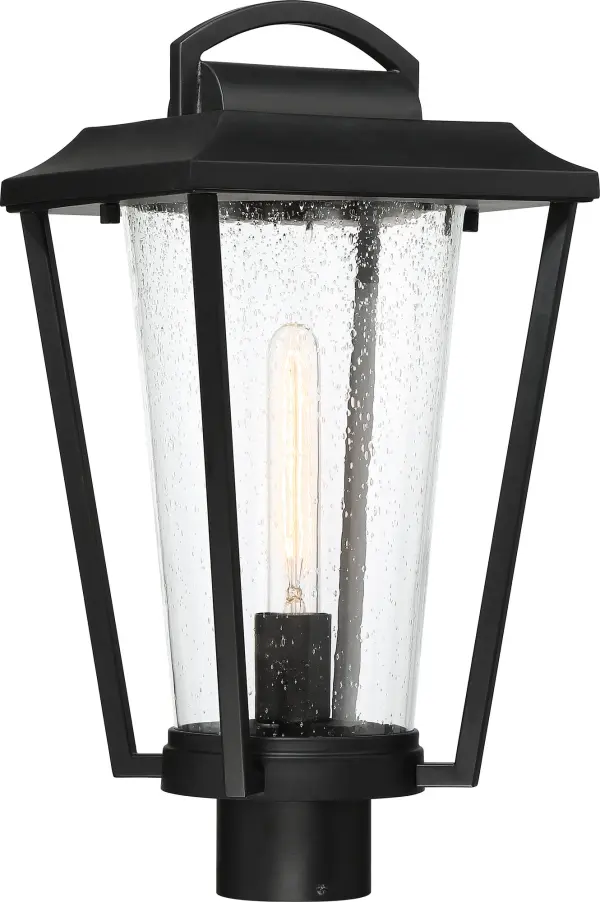 The Lakeview Post Lantern brings nostalgic elegance to outdoor spaces with its traditional carriage design. Clear seeded glass and aged bronze finish create authentic period charm perfect for walkways and gardens.