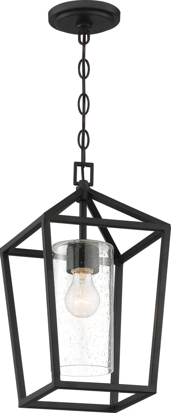 The Hopewell hanging lantern combines farmhouse charm with industrial durability. Its A-frame design and clear seeded glass chimney create a warm, inviting atmosphere perfect for outdoor spaces.
