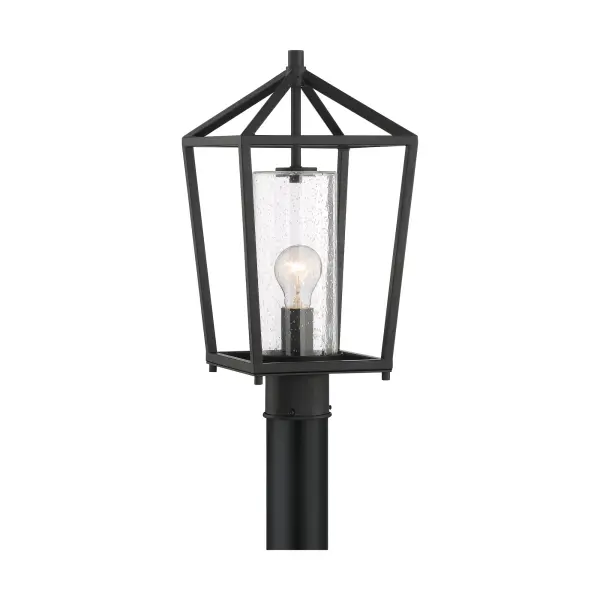 The Hopewell post lantern combines farmhouse charm with industrial durability. Its A-frame silhouette and clear seeded glass chimney create a warm, welcoming glow perfect for residential entryways or hospitality settings.