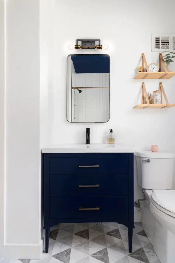 Intention 2-Light Vanity Light in Warm Brass and Black - Image 9
