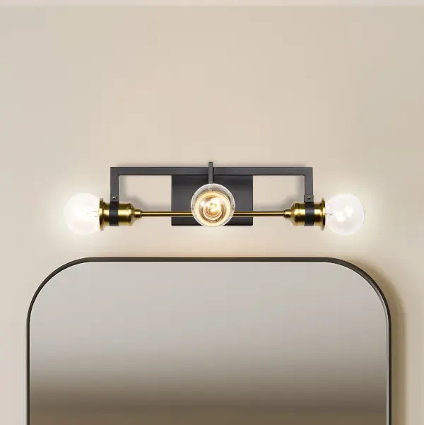 Intention 3-Light Vanity Light in Warm Brass and Black - Image 10