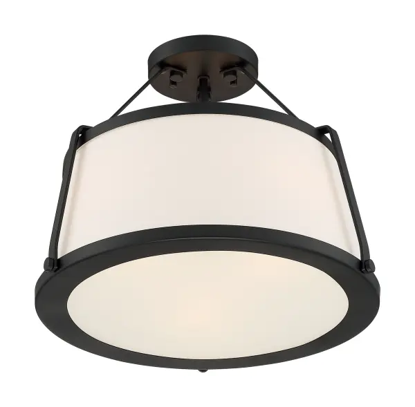 The Cutty semi-flush fixture combines a sleek matte black frame with a white linen shade and frosted diffuser for soft, even illumination. Its transitional design works across multiple decor styles, making it ideal for bedrooms, hallways, and offices.
