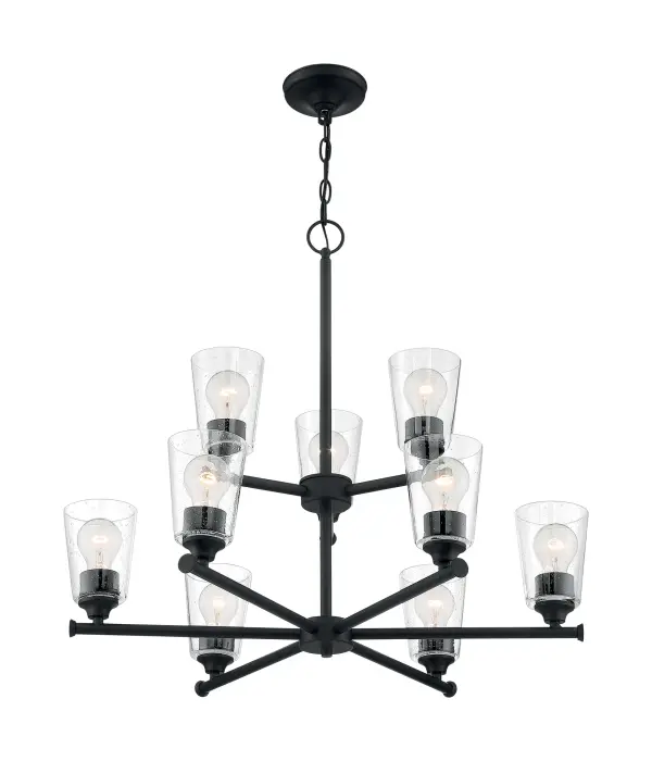 The Bransel 9-light chandelier combines modern farmhouse charm with coastal elegance through its matte black finish and seeded glass goblet shades. Perfect for high-ceiling spaces, this two-tier fixture delivers substantial lighting while maintaining a sleek, streamlined silhouette.