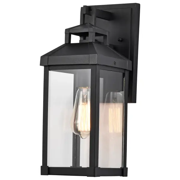 The Corning wall lantern delivers understated elegance with its carriage-inspired design and large clear glass panes. The deep matte black finish highlights subtle architectural details while maintaining versatility across home styles. - alternate view