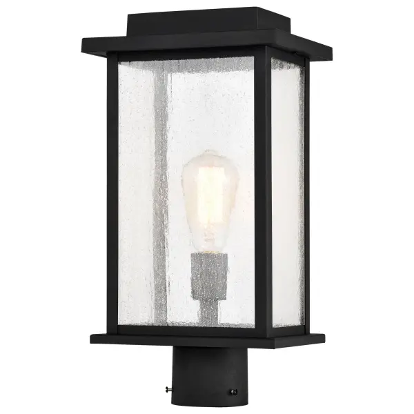 The Sullivan post light delivers no-nonsense styling with a stretched metal frame and clear seeded glass that creates beautiful bands of illumination. Its matte black finish coordinates effortlessly with any home exterior.
