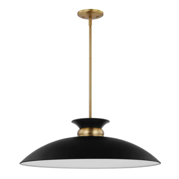 The Perkins large pendant combines understated elegance with eye-catching design through its matte black dome shade accented by a burnished brass band. The white interior maximizes light output while the swirling skirt detail adds visual interest.