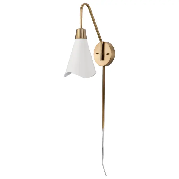 The Tango wall sconce combines minimalist style with sophisticated details. Its matte white shade features a laser-cut wave pattern edge, while burnished brass accents add warmth and visual interest to any space.
