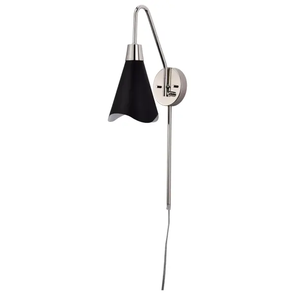 The Tango wall sconce combines matte black and polished nickel finishes for a sophisticated two-tone look. Its laser-cut wave pattern adds subtle visual interest while maintaining clean contemporary lines.