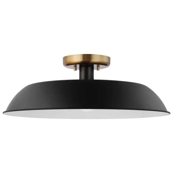 The Colony semi-flush combines loft-style industrial design with transitional elegance. Its matte black shallow pan shade features a white interior for optimal light reflection, while burnished brass accents add warmth.