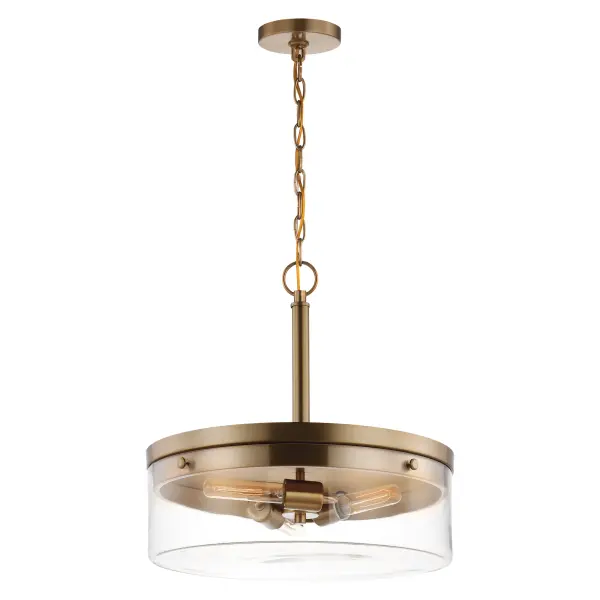 The Intersection pendant masterfully blends industrial, modern, and chic aesthetics with its burnished brass finish and clear glass shades. Perfect for showcasing vintage filament bulbs, this fixture adds nostalgic warmth while maintaining contemporary appeal. - alternate view