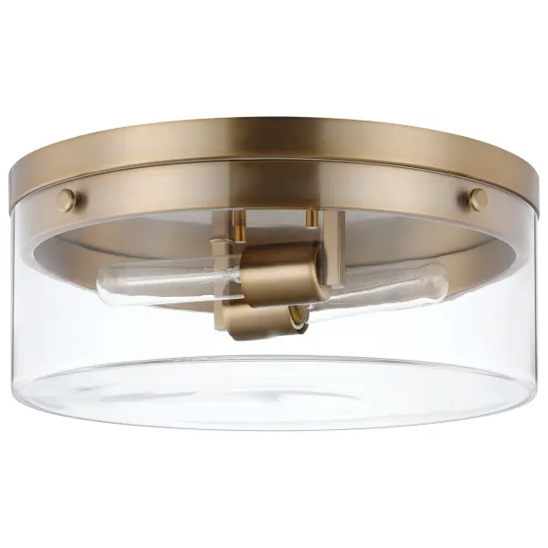 The Intersection flush mount beautifully blends industrial, modern, and chic design elements. Clear glass showcases vintage filament bulbs while burnished brass adds warmth and sophistication to any space.