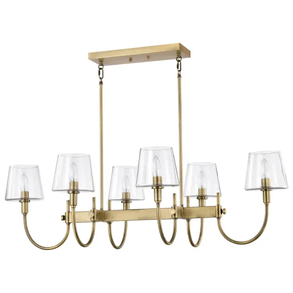 The Brookside 6-Light Island Pendant combines old-world charm with practical illumination. Its vintage brass finish and clear glass shades create a timeless look that works beautifully over kitchen islands and dining tables.