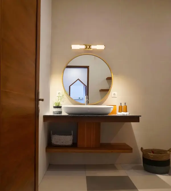 The Roselle 2-Light Vanity combines timeless natural brass with soft white glass for a sophisticated bathroom lighting solution. Its transitional design bridges classic and contemporary styles effortlessly. - alternate view